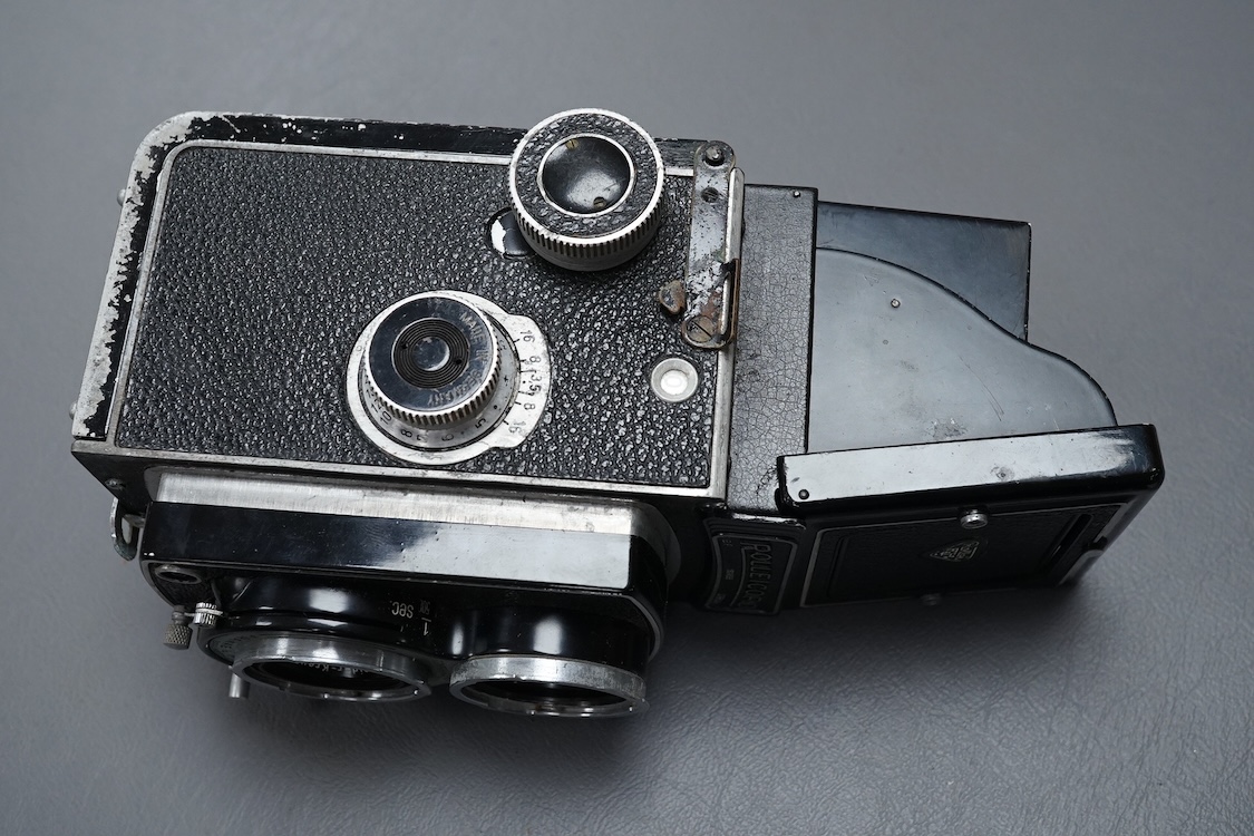 A vintage Rolleicord TLR camera, cased.